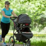 Woman-mom-with-stroller-walking-spring-istock-1