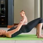 Shot of a young mother and her baby at home